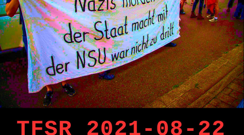 A banner reading "nsu morden | der staat macht mit | der NSU war nicht zu dritt", or "Nazis murder | the state participates | the NSU was more than 3 people"