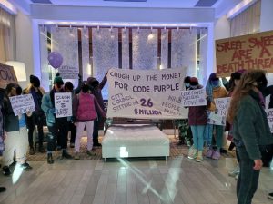 Housing activists occupying the lobby of Downtown Asheville's AC Hotel - Photo by Elliot Patterson (permission of Asheville Free Press)