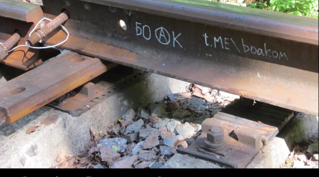 A sabotaged train rail with graffiti about BOAK, "Ongoing Sabotage & Resistance To War in Russia and Ukraine | TFSR 17-07-22"